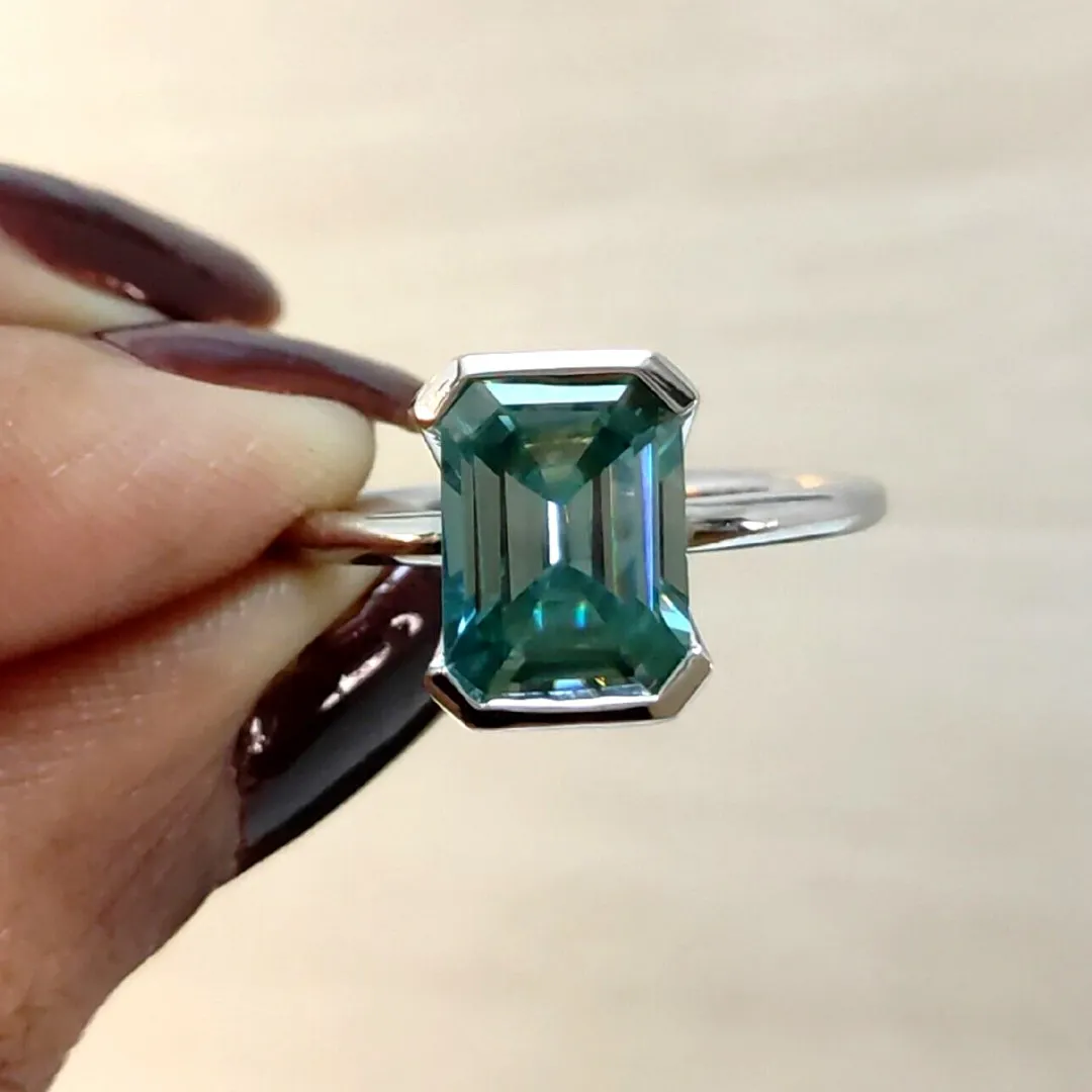 /public/photos/live/Blue Green Emerald Half Bezel Set Moissanite Solitaire Ring 652 (4).webp